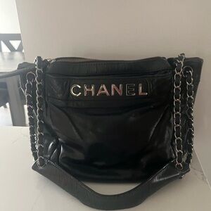 CHANEL Black Leather Handbag with Silver Details
